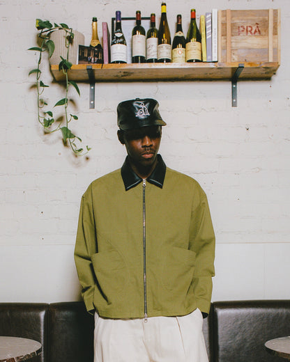 insignia pillbox cap - oil/ivory